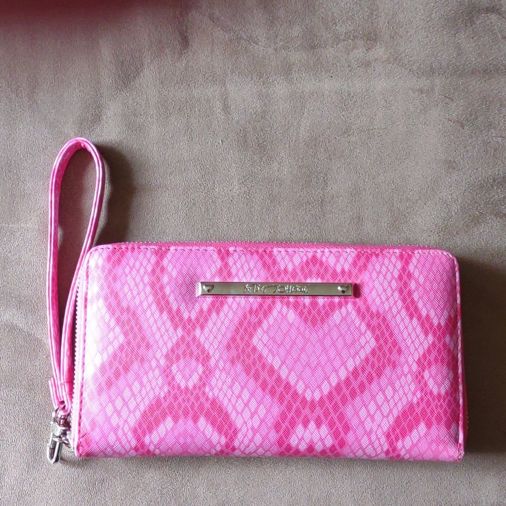Betsy Johnson pink wristlet.